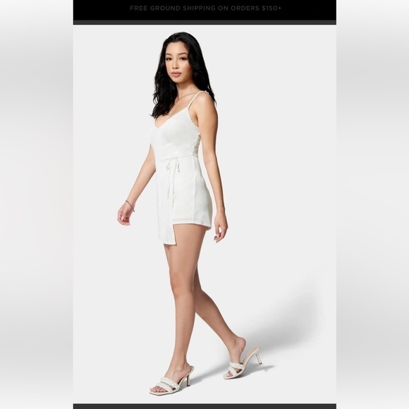 NWT-Bebe-XL-white-stretchy, adjustable straps, wrap skirt romper. Built in short - Picture 3 of 13